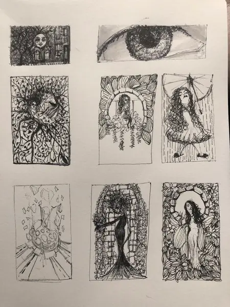 A sketchbook page gathers small studies of imagined characters, forms, and environments.