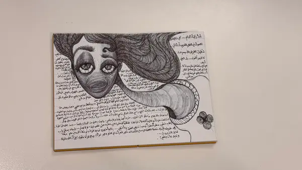 An imagined face combines large eyes with sweeping ornamental lines.