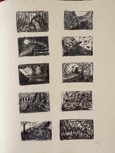 A sketchbook page gathers small studies of imagined characters, forms, and environments.