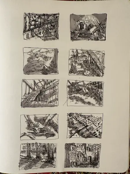 A sketchbook page gathers small studies of imagined characters, forms, and environments.