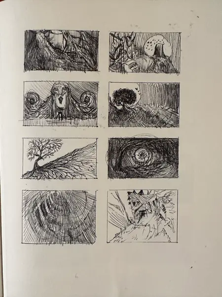 A sketchbook page gathers small studies of imagined characters, forms, and environments.