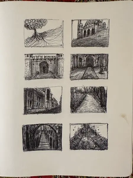 A sketchbook page gathers small studies of imagined characters, forms, and environments.