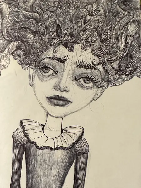 An imagined face is framed by curling leaves and flower-like shapes.