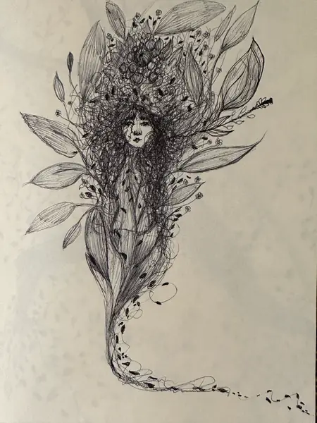 An imagined face appears within a symmetrical arrangement of leaf-like forms.