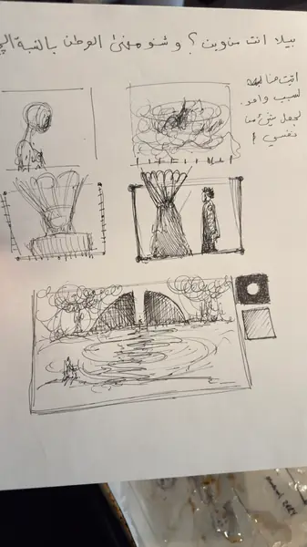 A sketchbook page gathers small studies of imagined characters, forms, and environments.