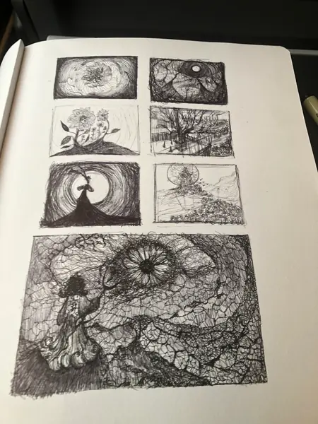 A sketchbook page gathers small studies of imagined characters, forms, and environments.